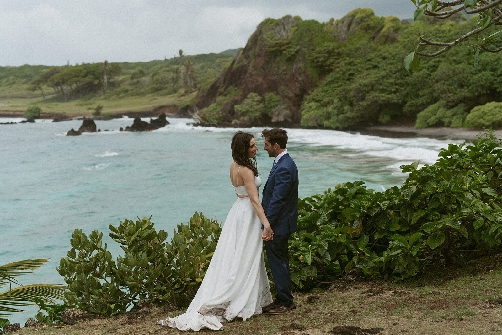 A couple elopes on the coast of Maui's Road to Hana with their Maui Elopement Photographer